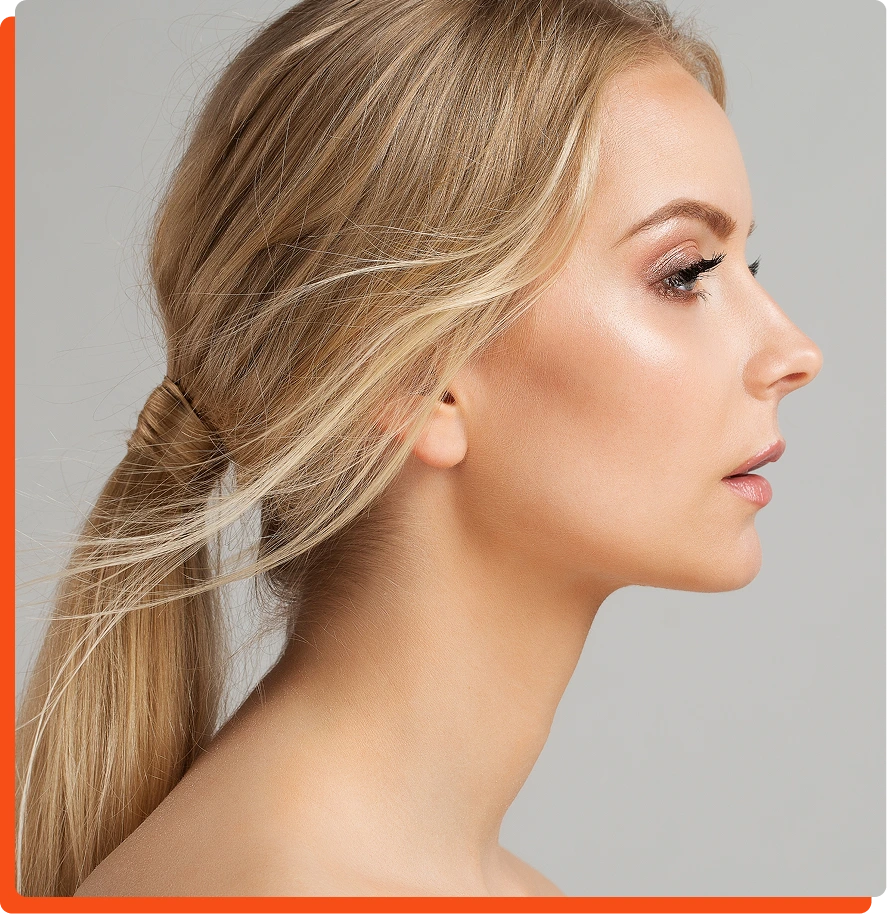 Woman in profile with blonde hair showing smooth skin and defined facial contours